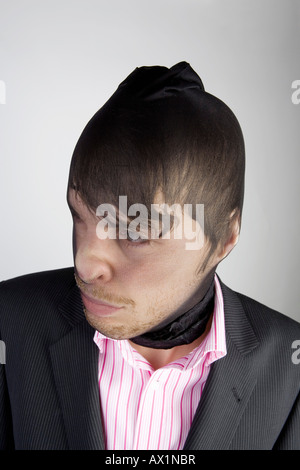 A robber wearing a disguise Stock Photo