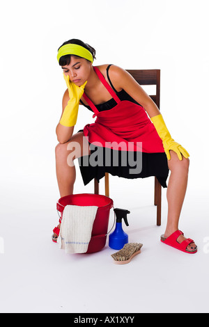 Cleaning lady takes a break Stock Photo