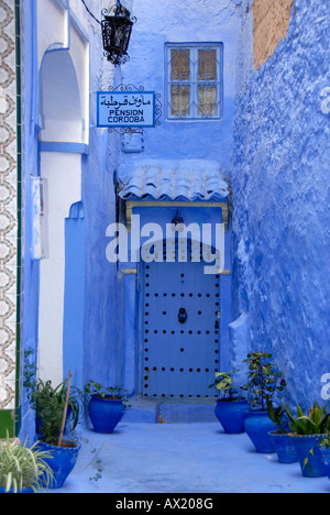 Luminous blue gate of Pension Cordoba medina Chefchaouen Morocco Stock Photo