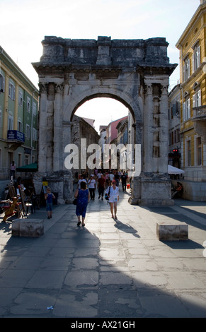 Roman triumphal arch, pedestrian zone, historic town of Pula, Istria, Croatia Stock Photo