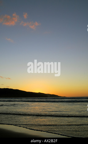 Sunset 90 mile beach Ahipara New Zealand Stock Photo
