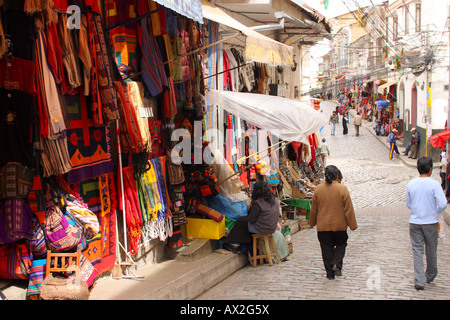 Tourists and locals mingle in the Witches' Market shopping district of La Paz, Bolivia. Stock Photo