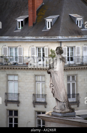 Statue of Anne de Bretagne (Anne of Brittany) on the rooftops, Nantes, France Stock Photo