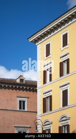 Windows and coloured walls in Rome Stock Photo