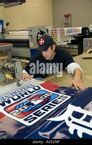 Workers Make Detroit Tigers Banners for World Series Stock Photo