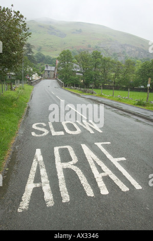 A road sign in Welsh and English in the village of Llangynog in Powys Wales May 2004 Stock Photo