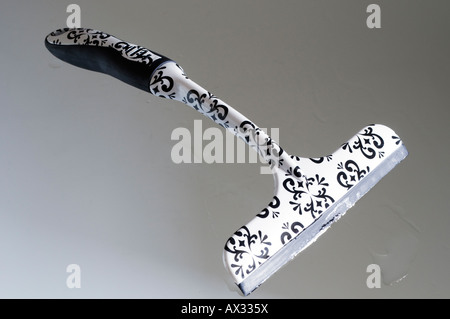 Squeegee and water drops Stock Photo