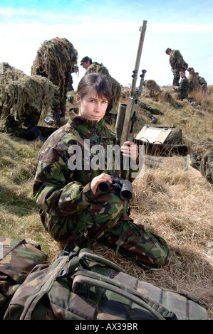 A BRITISH ARMY FEMALE RECRUIT AT A FIRING RANGE IN BRECON WALES DURING A SNIPER TRAINING COURSE
