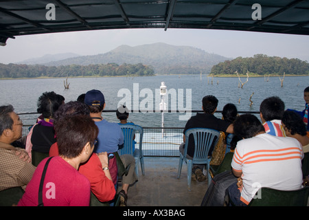 Tourists on boat, Periyar Lake, Periyar Wildlife Sanctuary, Thekkady, near Kumily, Kerala, India Stock Photo