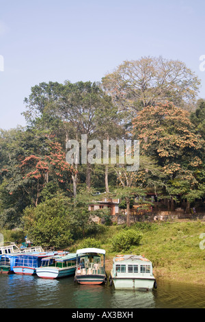 Boats at lakeside, Periyar Lake, Periyar Wildlife Sanctuary, Thekkady, near Kumily, Kerala, India Stock Photo