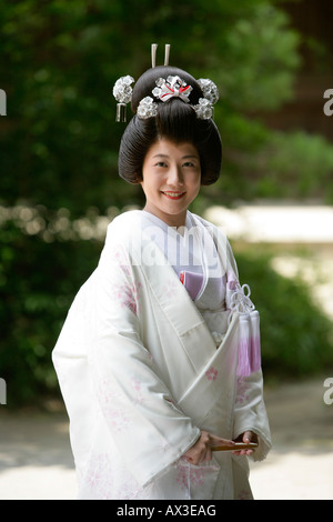 Japanese bride in wedding dress at Meiji Jingu shrine, Tokyo, Japan. Stock Photo