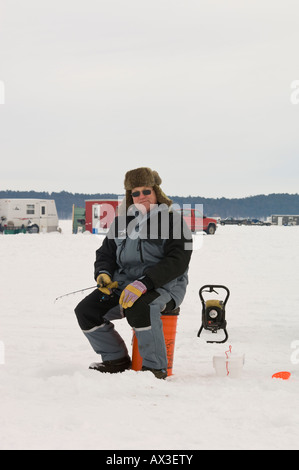 Ice fisherman sitting on bucket hi-res stock photography and images - Alamy