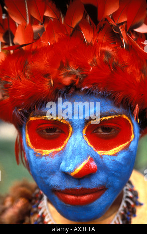 A young male prepares for a 'sing sing' ceremony in Mt.Hagen.