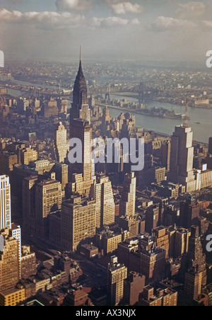 New York skyline in hazy sunshine viewed from Empire State Building looking looking north east, c. 1950 Stock Photo