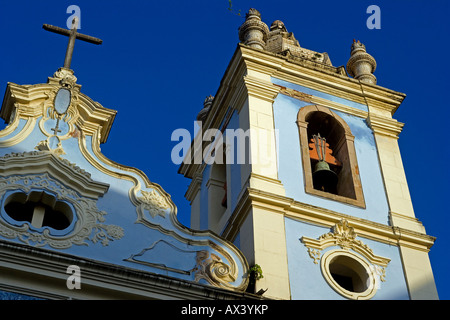 Brazil, Bahia, Salvador. Within the historic Old City, a UNESCO World Heritage site, the front facade and bell tower. Stock Photo