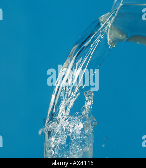water pouring into glass Stock Photo