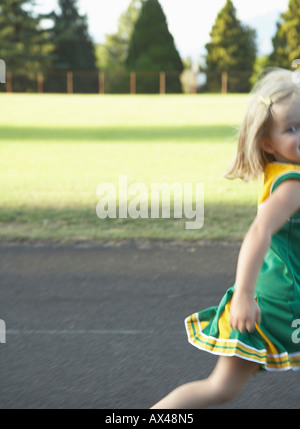 Girl Running on Track Stock Photo