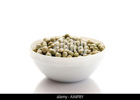 Green peas in bowl Stock Photo