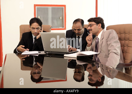 Business team working in a boardroom in an office Stock Photo