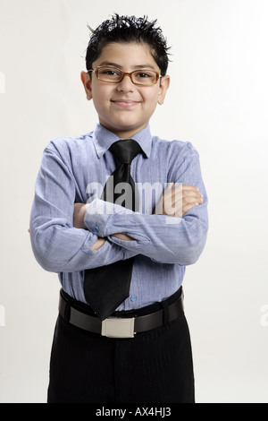 Portrait of a boy pretending like a businessman Stock Photo