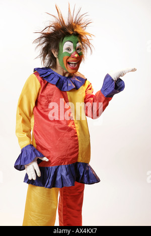 Portrait of a joker gesturing and laughing Stock Photo