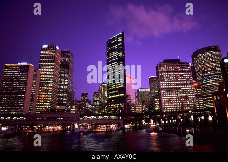 Colorful night time graphic sunset of Sydney Skyline from Circular Quay in New South Wales Australia Stock Photo