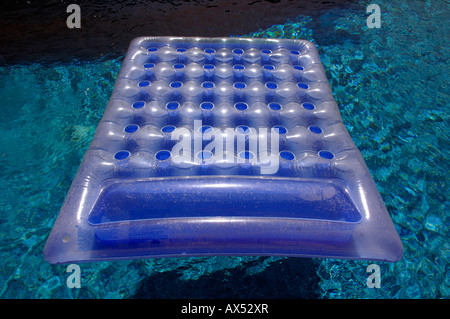 Double blue lilo inflatable bed hi res stock photography and images Alamy