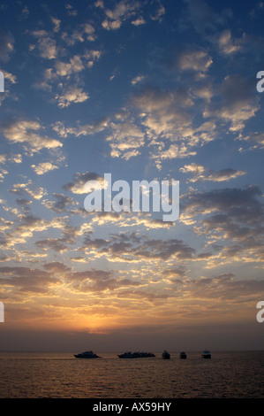 Sunset over the Red Sea with tourist ships, Egypt Stock Photo