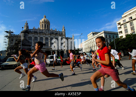 Children running in front of the Museum of the Revolution, Presidential Palace, Havana, Cuba, Caribbean Stock Photo