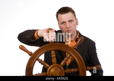 Manager with a steering wheel Stock Photo