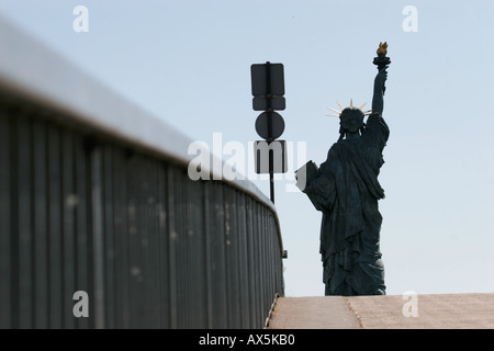 Statue of Liberty on Ille aux Cygnes Island by Seine River, Paris France Stock Photo