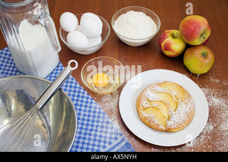 Apple pancakes surrounded by ingredients Stock Photo