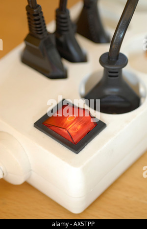 On/off switch on a power bar: saving energy Stock Photo