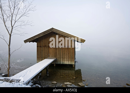 Boathouse on the shore of the Kochelsee (Lake Kochel) enshrouded in mist, Bavarian pre-Alps, Upper Bavaria, Bavaria, Germany, E Stock Photo