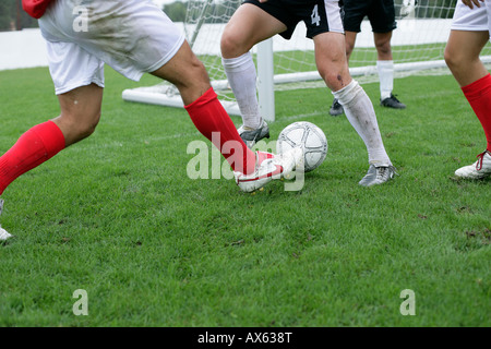 Soccer player in action Stock Photo