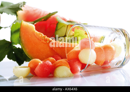 Melon balls in lying glass Stock Photo