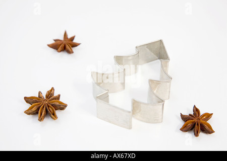 Cookie cutters and star-anise Stock Photo