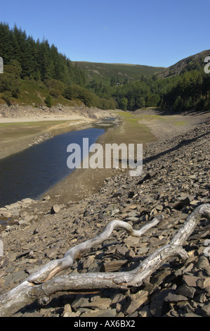 Extreme low water Garreg ddu reservoir from which Birmingham gets its drinking water in the Elan Valley Mid Wales UK Stock Photo