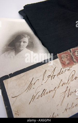 Closeup of Black edged victorian letter announcing death with accompanying black and white photo Stock Photo