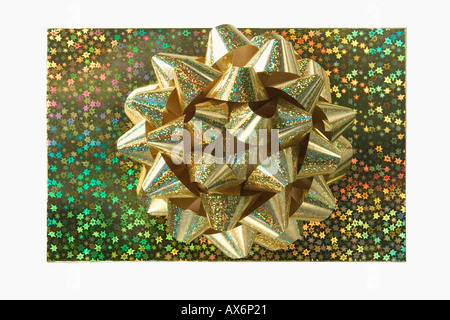 Golden bow on a gift Stock Photo