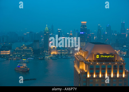 Cityscape lit up at night Stock Photo