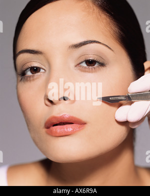 Woman having cosmetic surgery Stock Photo