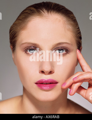 Woman wearing pink lipstick Stock Photo