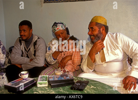 Moroccans, Moroccan, man, woman, girl, child, father, grandfather, grandmother, granddaughter, home, Fes el-Bali, Fez, Morocco, North Africa, Africa Stock Photo