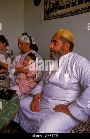 Moroccan family, living room, at home, Fes el-Bali, city of Fez, Morocco Stock Photo