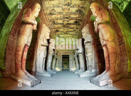 Colossal statues of Ramesses II, lining the route to the inner sanctum. The Great Temple, Abu Simbel, Egypt. Stock Photo
