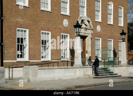 Foundling Museum with friendly young couple on entrance steps, Brunswick Square, Bloomsbury, London, England Stock Photo