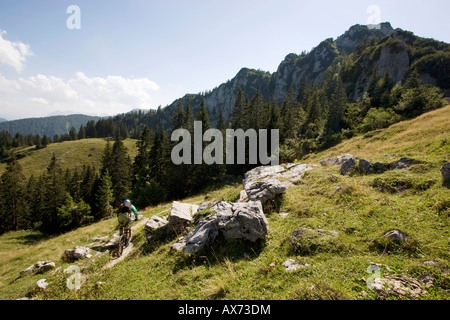 Germany, Bavaria, Kampenwand, mountainbiker on the way Stock Photo