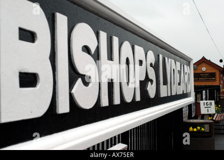 sign on the platform of Bishops Lydeard Station at the start of the West Somerset Railway line to Minehead WSR Stock Photo