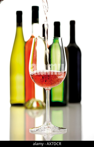 Wine poured into wine glass Stock Photo